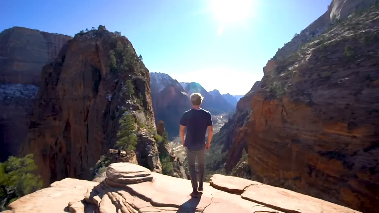 Steep red cliffs and canyon views of a high desert slot canyon leading to a dramatic overlook