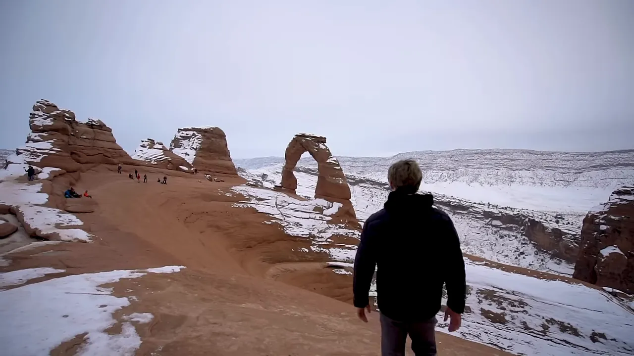 Sunlit sandstone arch formation representing Utah's varied landscapes