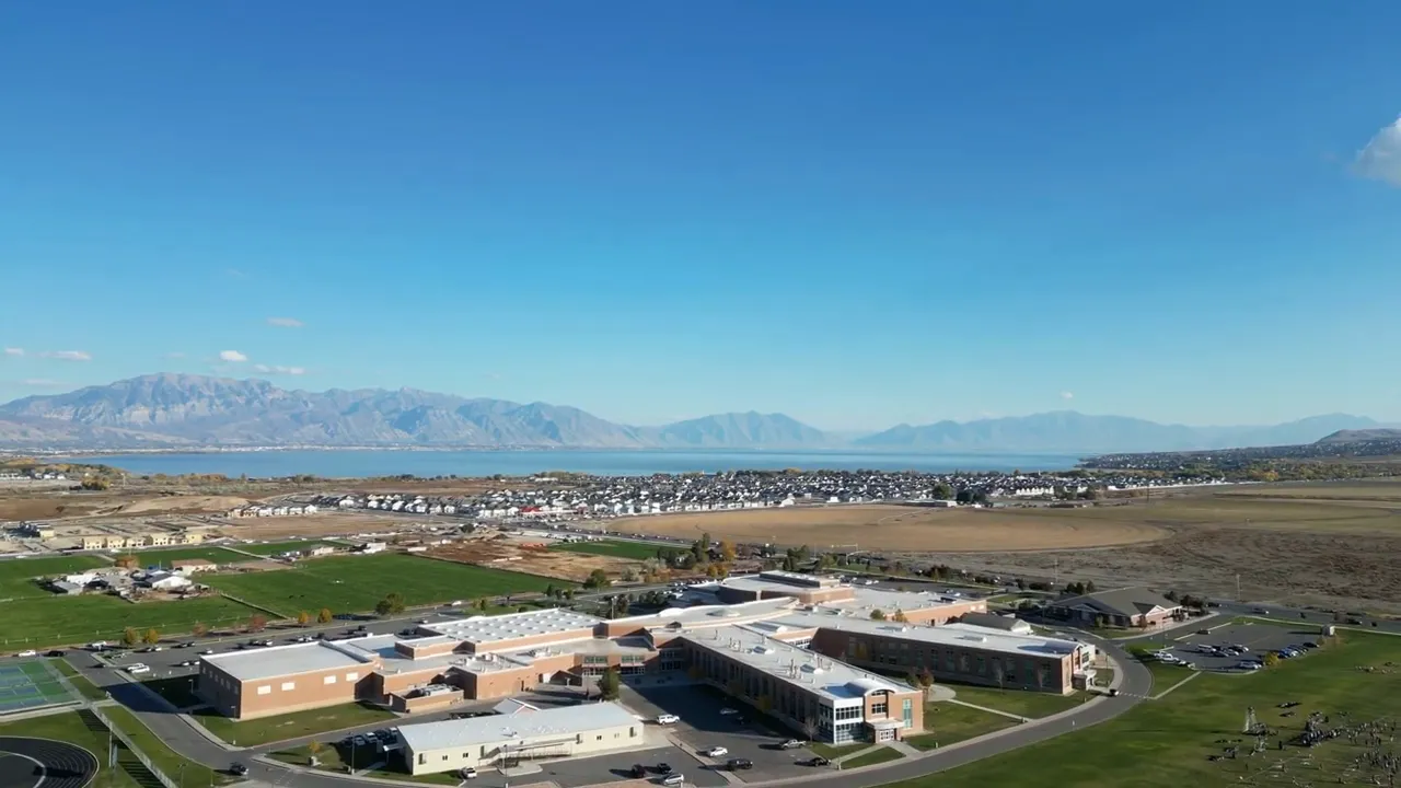 View of Utah Lake and mountain backdrop from a nearby golf-course-area spot