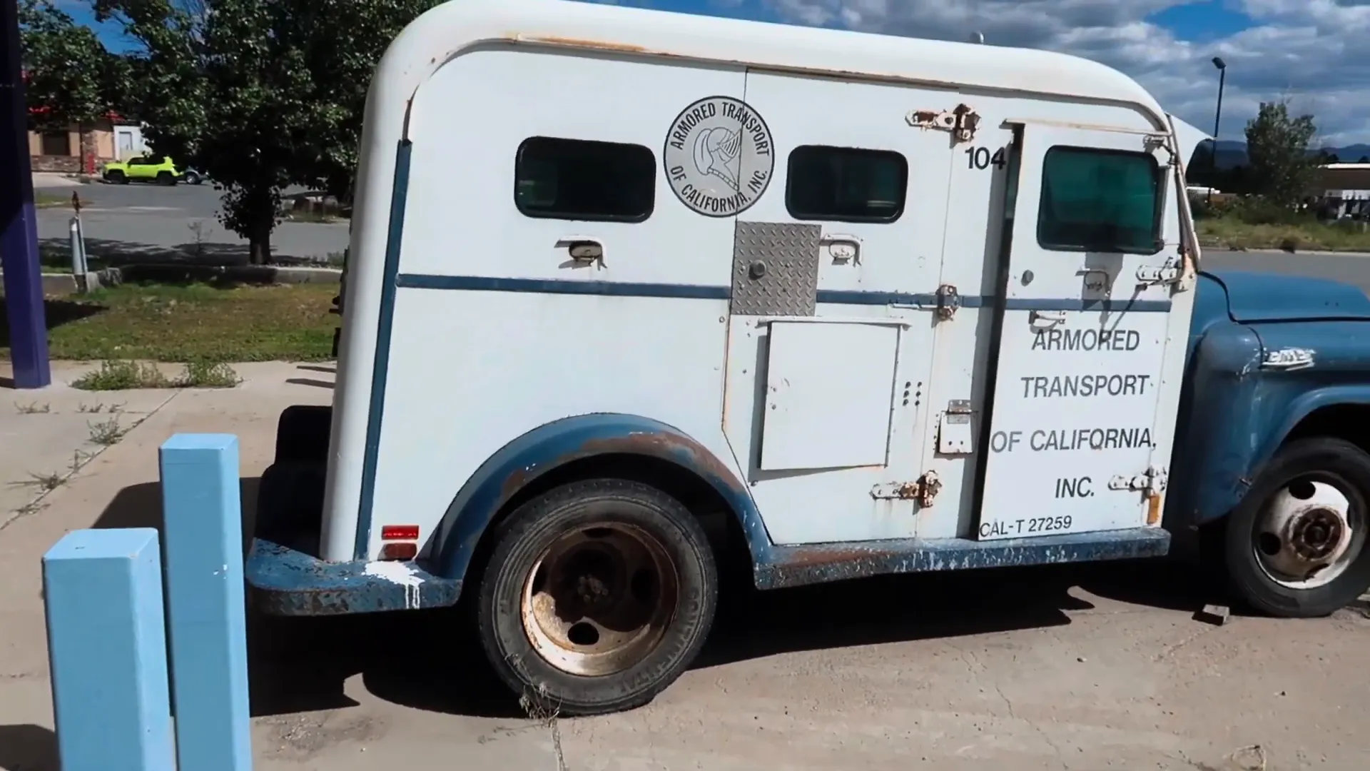 Vintage armored transport vehicle and classic cars in Beaver
