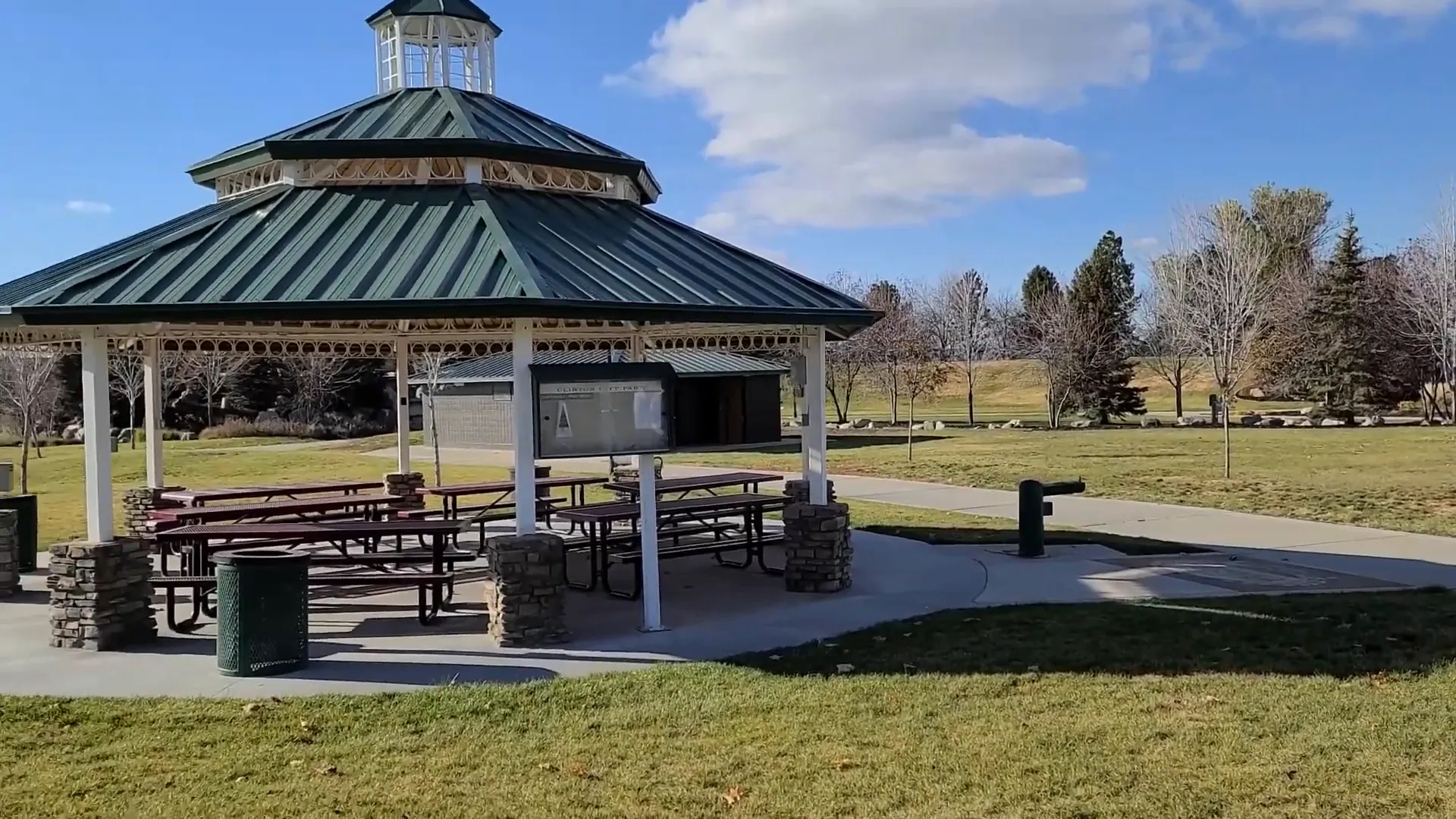 Family enjoying a sunny day in a Clinton park