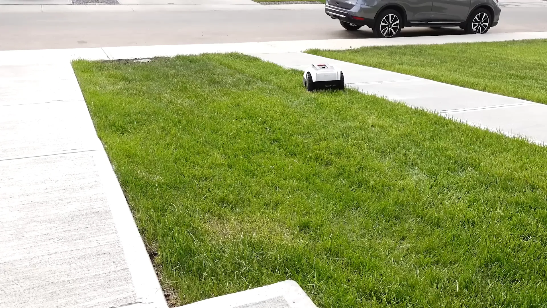 Ecovacs Goat O1000 RTK robot lawn mower on the grass