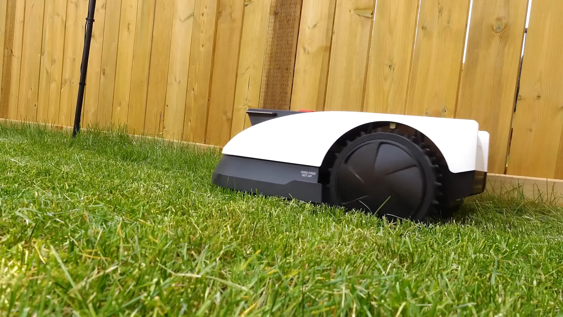 Ecovacs Goat navigating close to lawn edges with RTK technology