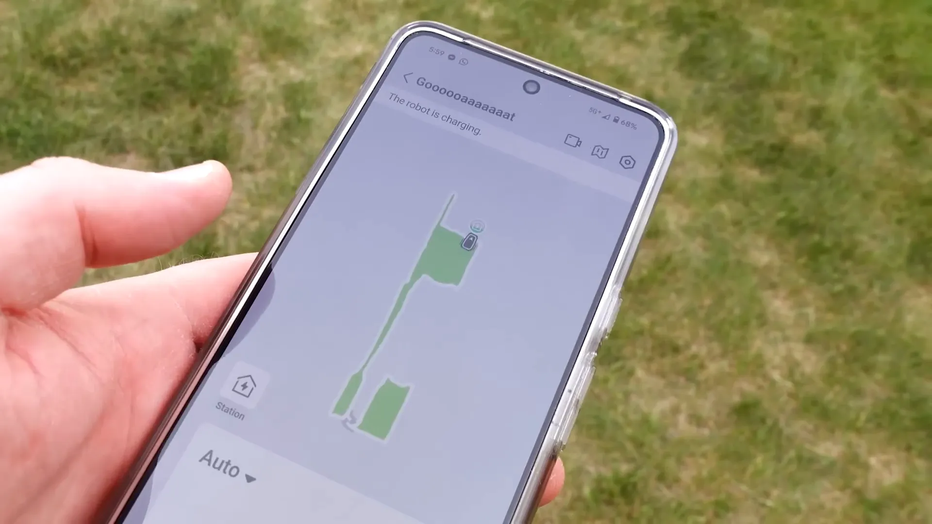 Mapping interface showing lawn layout with obstacles and zones