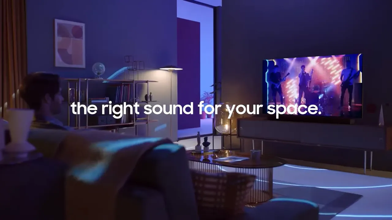 Samsung HW S800B slim soundbar beside a modern flat-screen TV