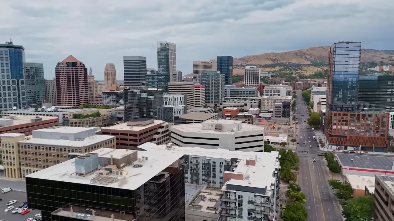 Salt Lake City skyline with new high-rise towers visible against the mountains