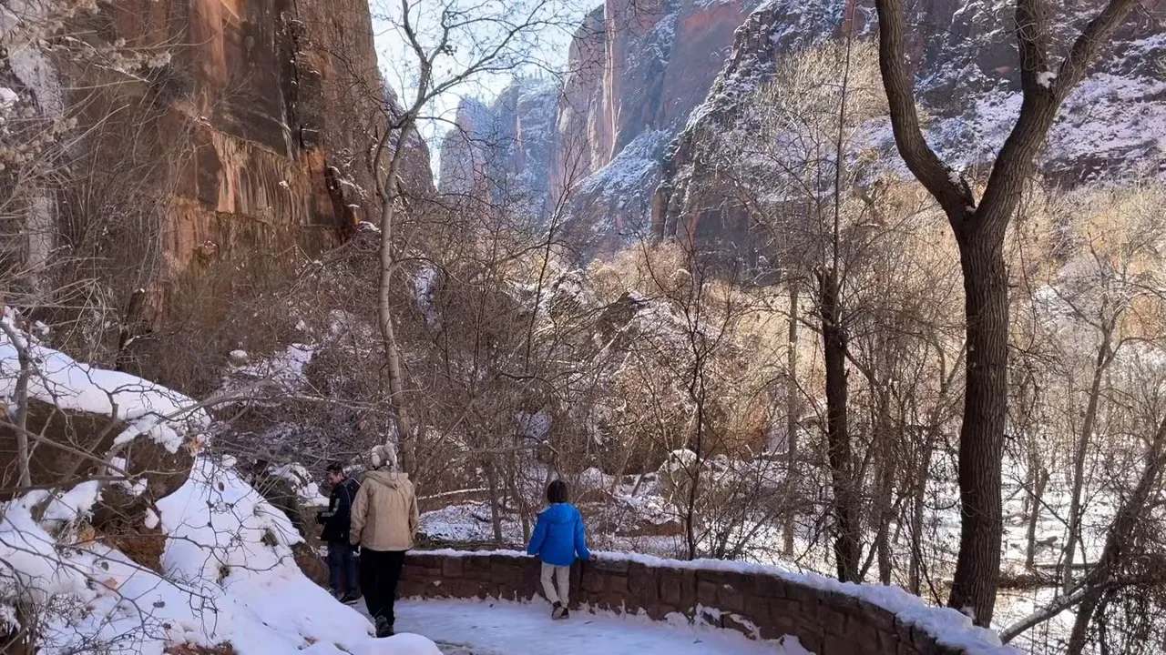 Hikers at the gateway to Zion National Park visible from surrounding southern Utah terrain
