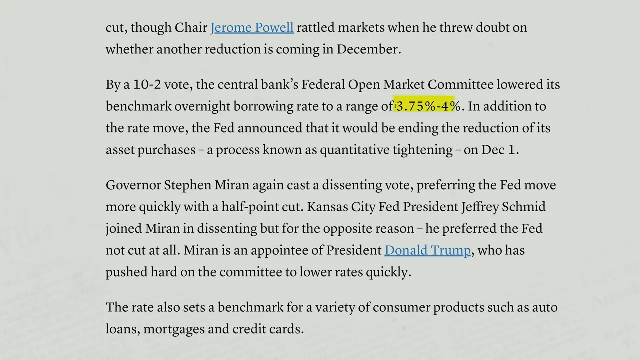Federal Reserve interest rate range announcement showing new federal funds rate 3.75% to 4%