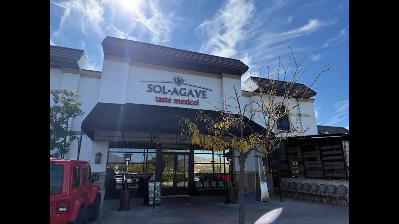 exterior of Sol-Agave restaurant with sign above the entrance on a sunny day