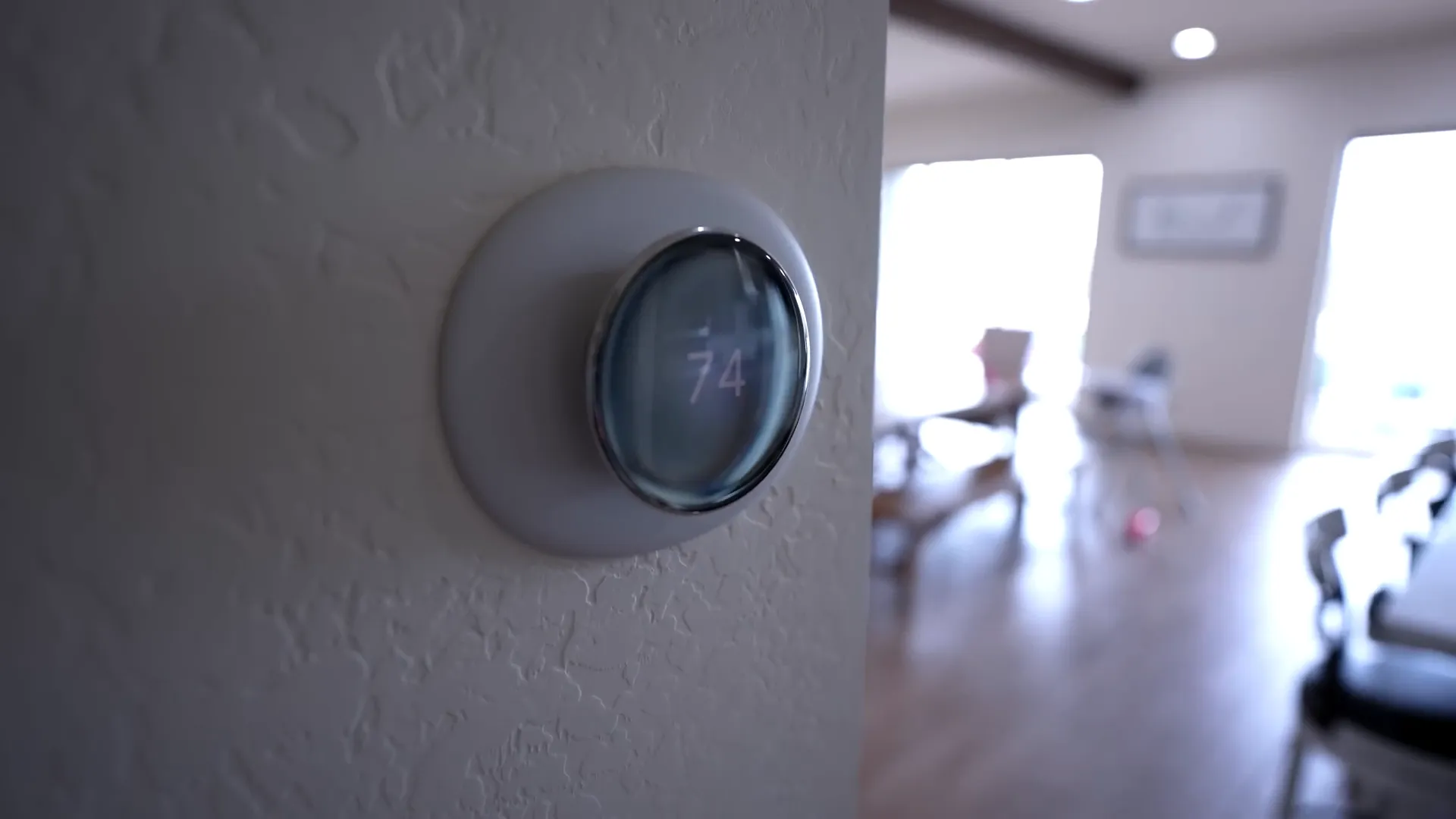 Nest thermostat curved glass display with reflections