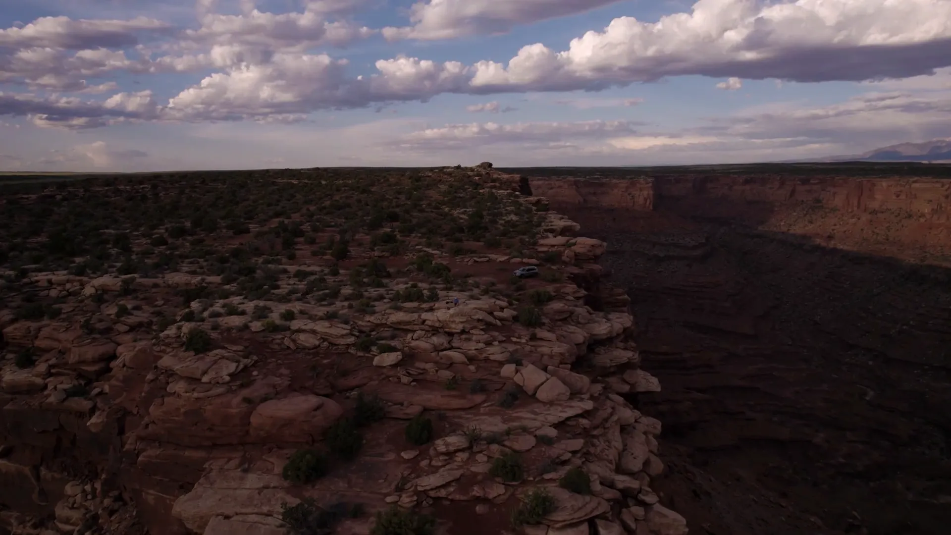 Panoramic view from Marlborough Point showing La Sal Mountains and desert landscape