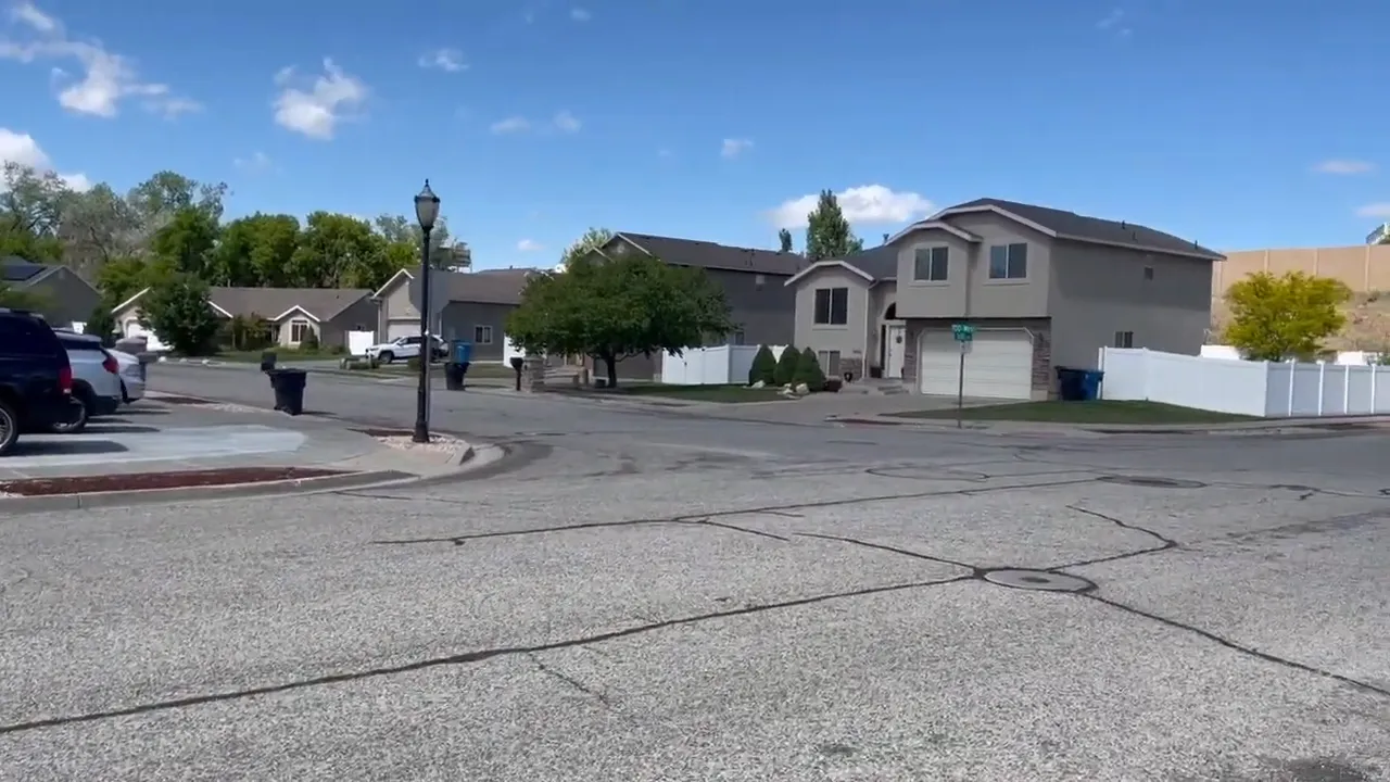 Family-friendly neighborhood in Riverdale with well-maintained homes and garages