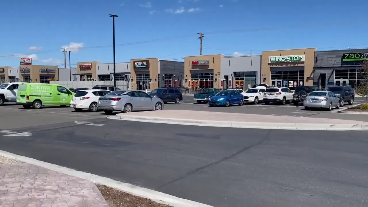 Busy main street in Riverdale with shops and restaurants