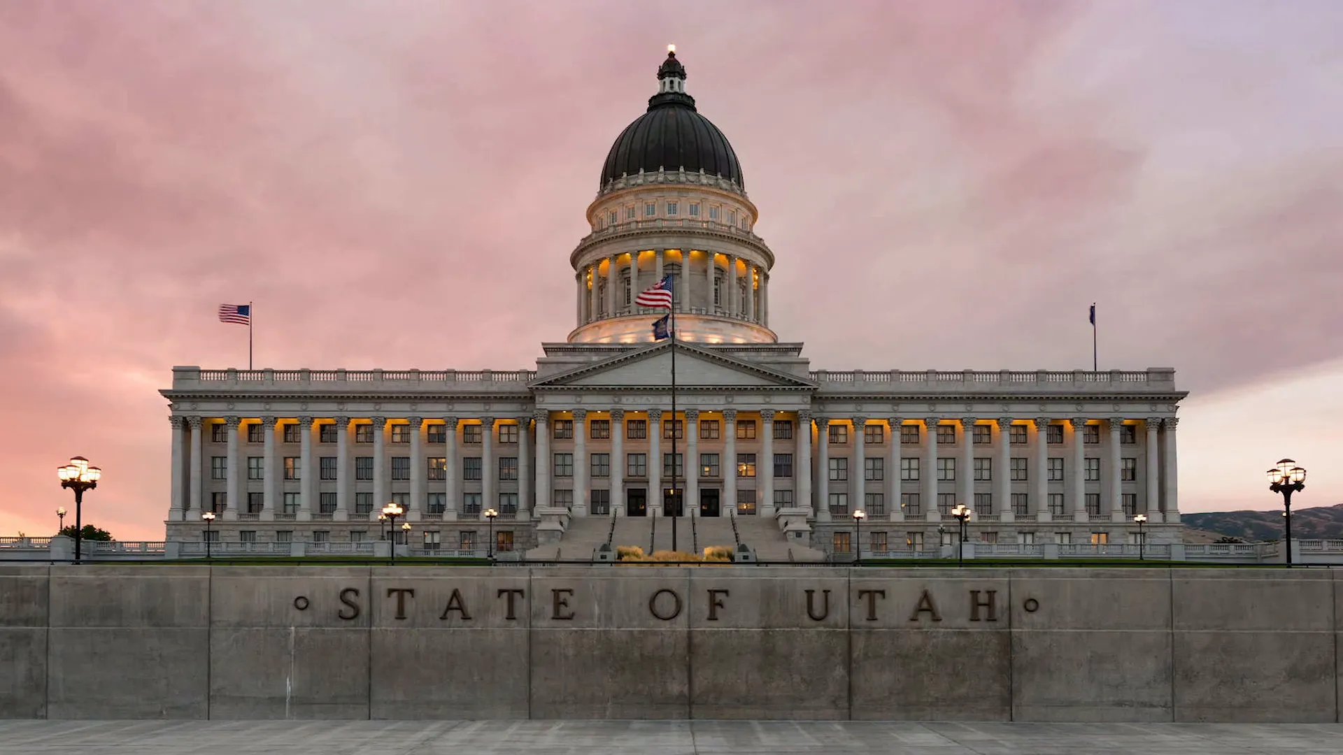Utah State Capitol building surrounded by blooming cherry blossoms
