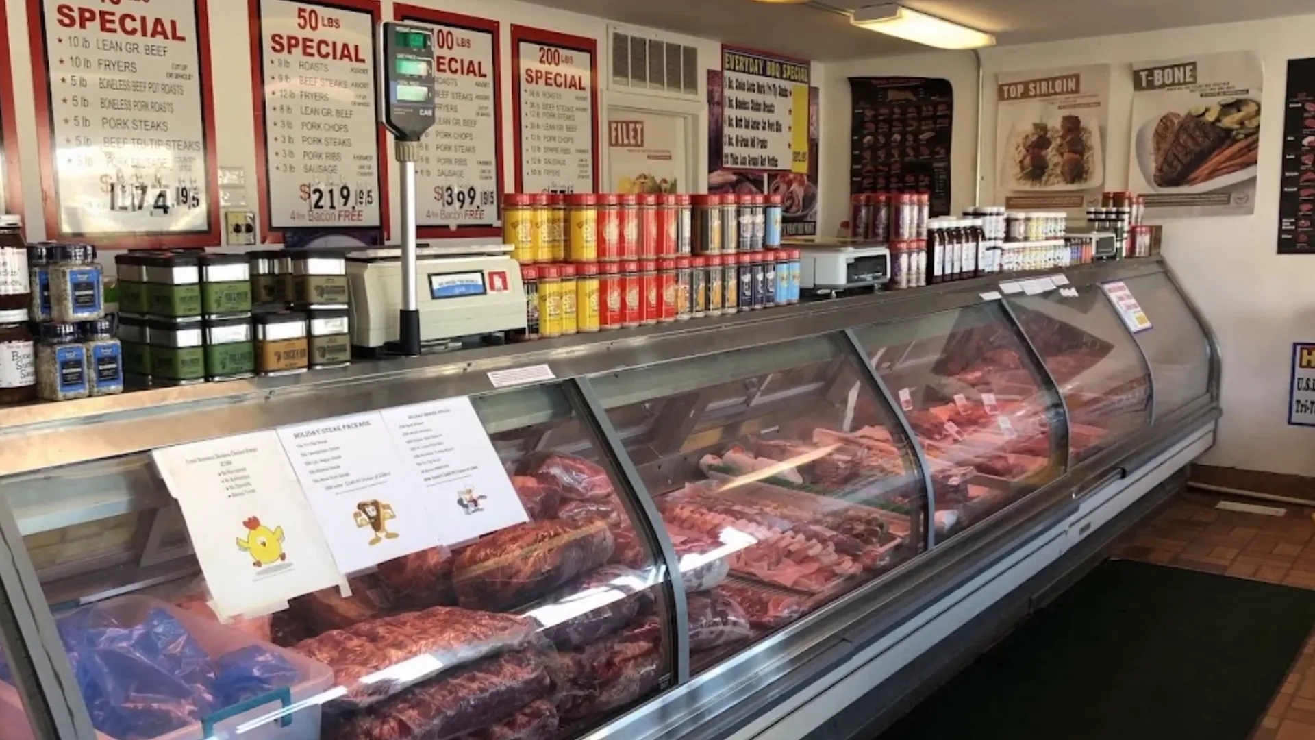 Interior of Don's Meats butcher shop with fresh meat displays