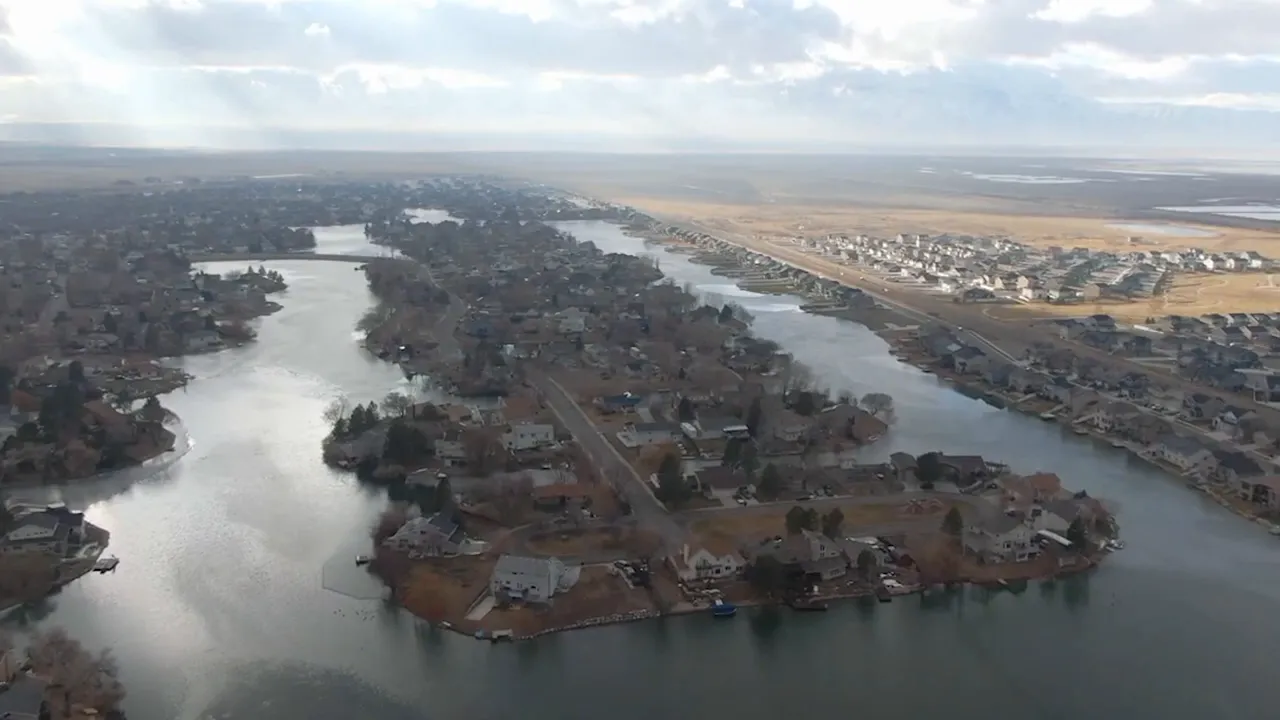 Stansbury Lake with homes and walking paths along the shoreline